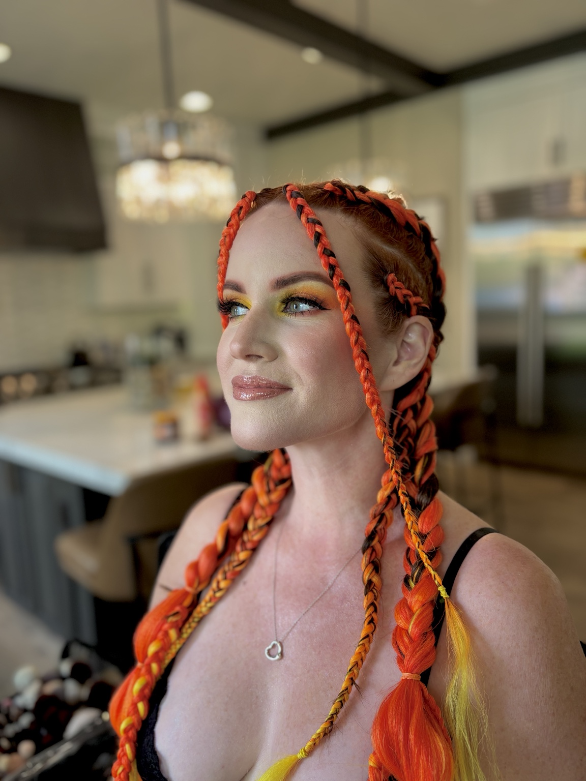 Creative finished beauty look with red braided hair