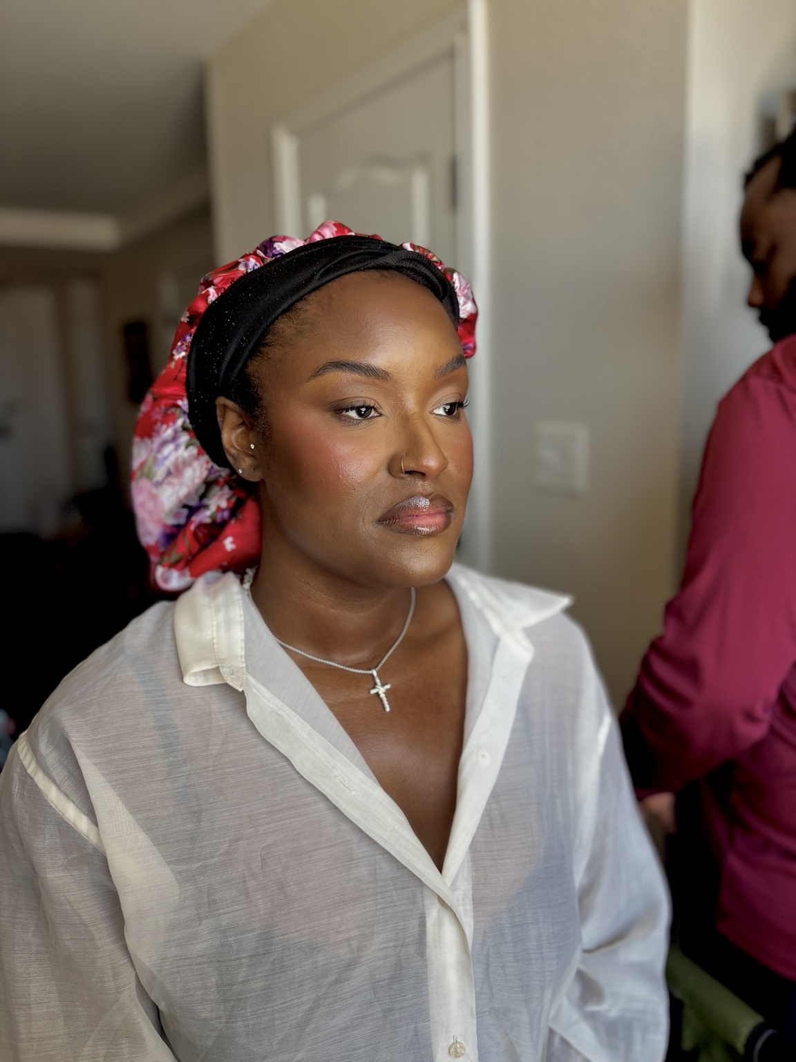 Polished makeup on client with deep complexion