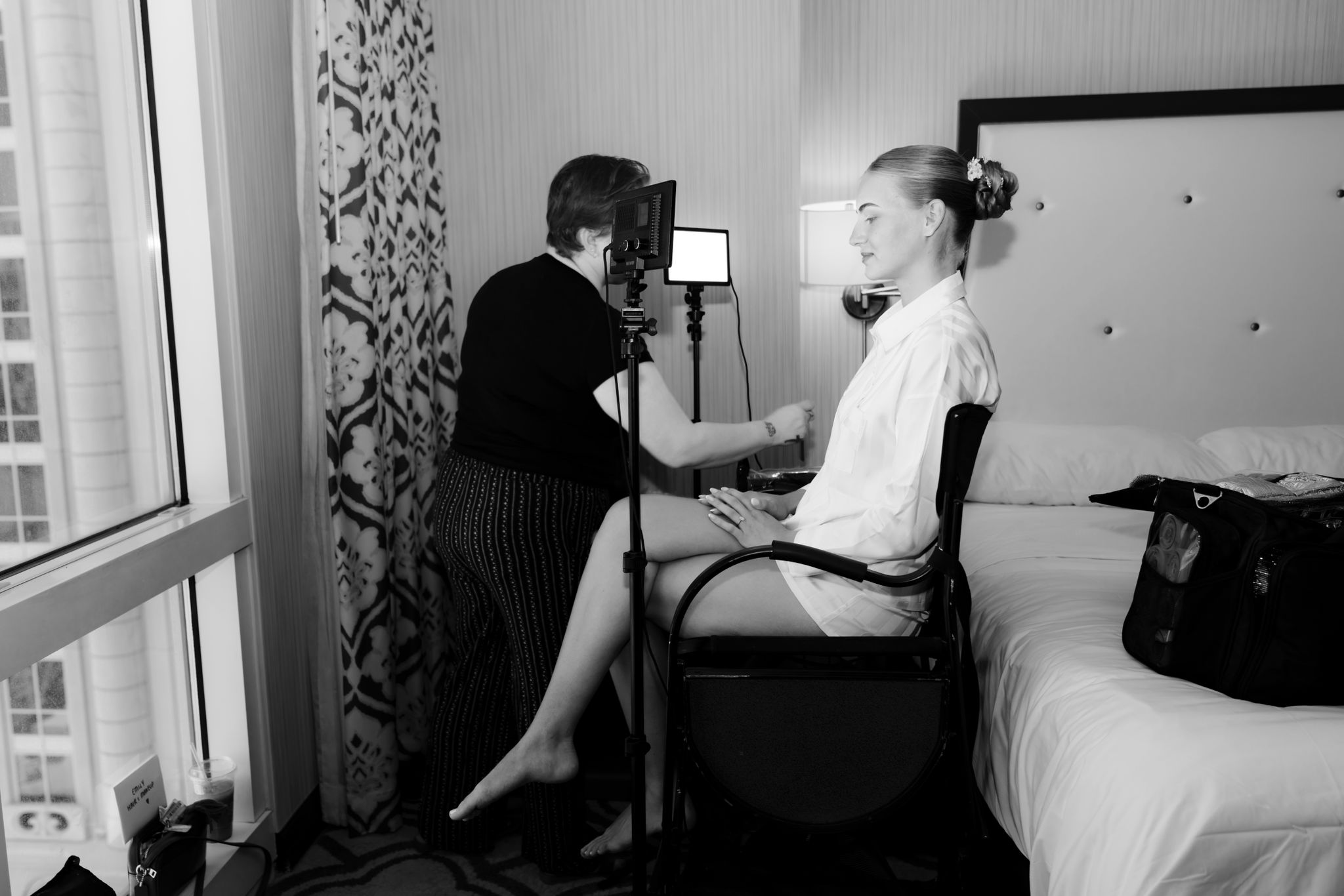 Emily working on a client's hair